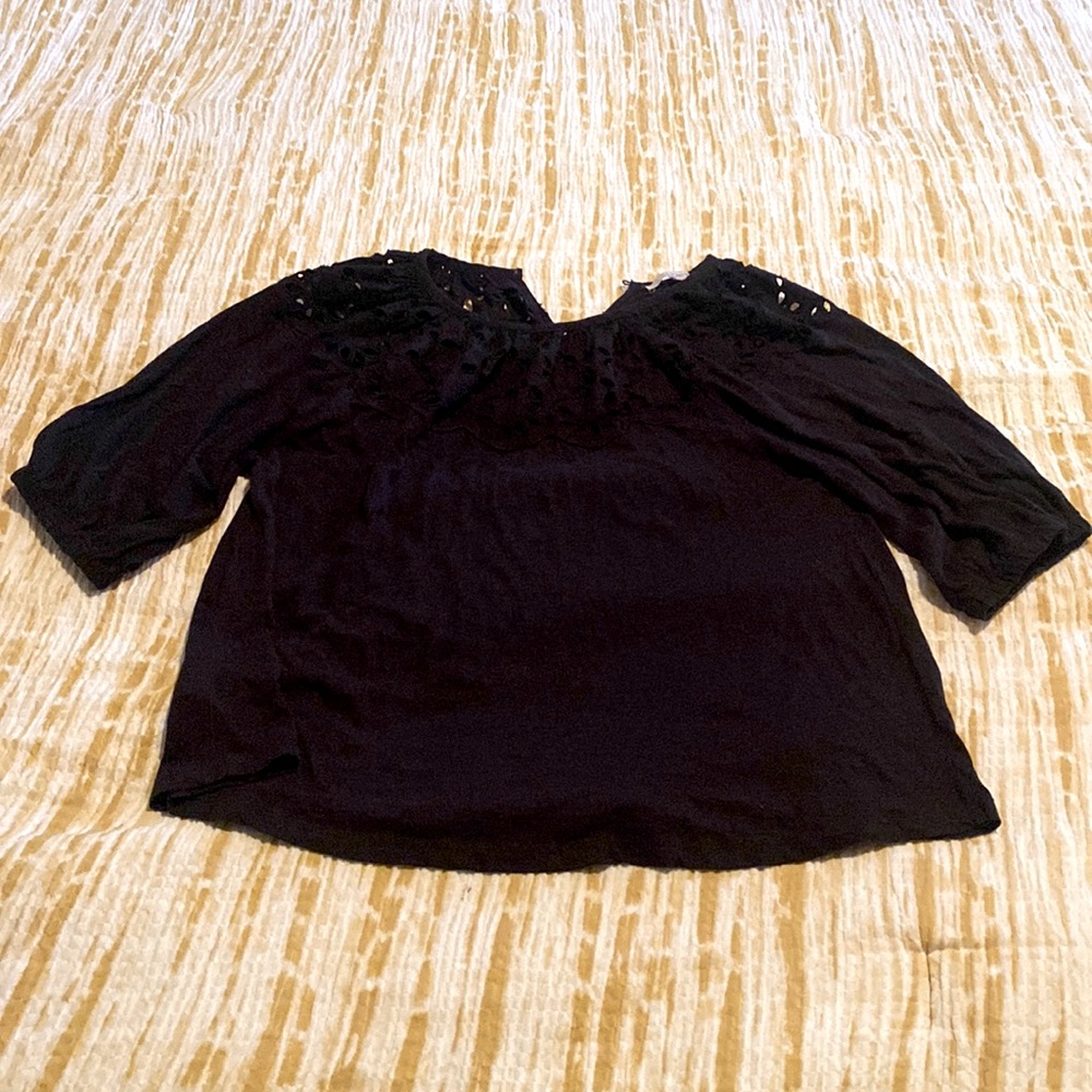Black eyelet tee.  Buttons in the back!